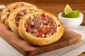 Arabic meat sfiha on the table.