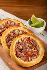 Arabic meat sfiha on the table.