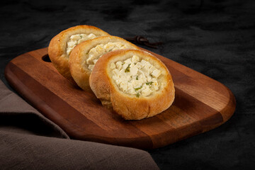 Arabic cheese sfiha on the table.