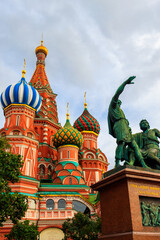 Fototapeta na wymiar Monument of Minin and Pozharsky at front of St. Basil cathedral on Red Square in Moscow, Russia