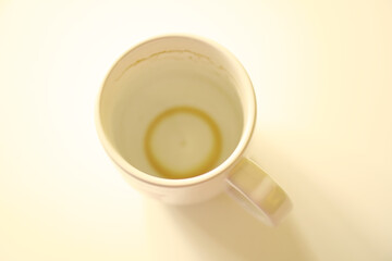 Empty a cup of coffee, selective focus 