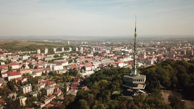 Cinematic aerial drone footage of Miskolc, fourth largest city and a major industrial hub, Northern regional center of Hungary, capital of Borsod-Aba&uacute;j-Zempl&eacute;n county