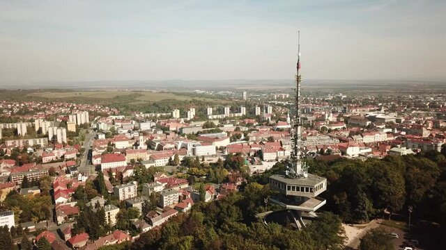 Cinematic aerial drone footage of Miskolc from the Avas TV Tower, fourth largest city and a major industrial hub, Northern regional center of Hungary, capital of Borsod-Aba&uacute;j-Zempl&eacute;n county