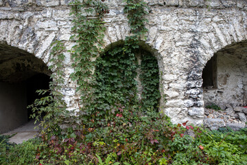 Naklejka premium arches of an old ruined brick ancient destroyed building