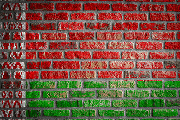 National flag of Belarus. depicting in paint colors on an old brick wall. Flag  banner on brick wall background.