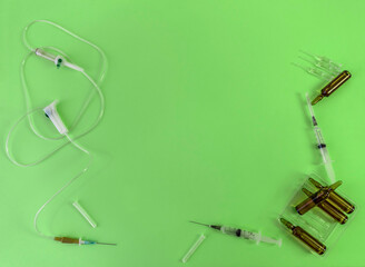 Obraz premium Flat Lay on medicine and healthcare. Treatment of patients and vaccination from coronavirus. Syringes, dropper, ampoules.