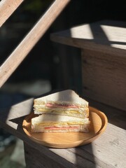Breakfast which homemade Sandwich on wood tray