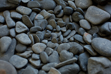 Black pebbles on the beach