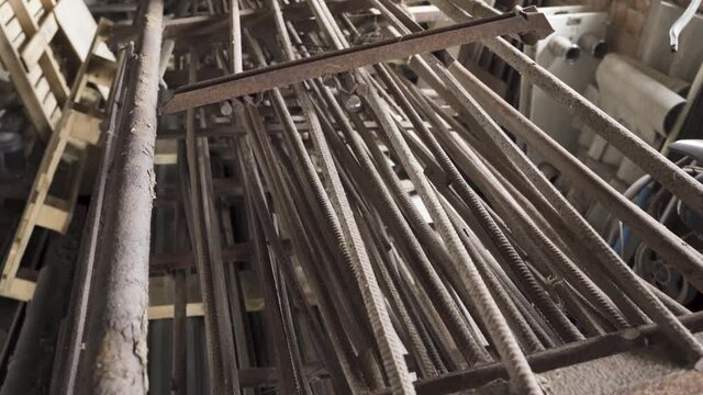 Old and rustic armature pieces and metal scrap in old warehouse