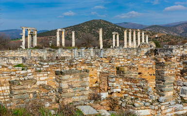 Fototapeta premium Columns surrounded with ruins in ancient greek city Aphrodisias in Turkey