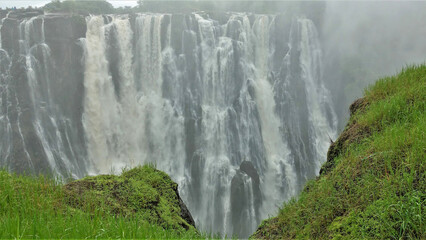 The unique Victoria Falls collapses into the gorge with powerful streams. The abyss is shrouded in...
