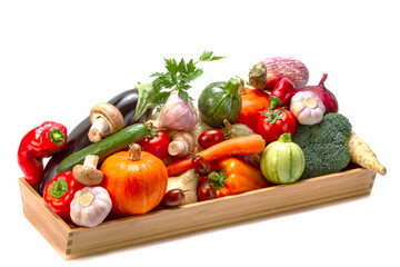 Assorted organic vegetables in a wooden box on a white isolated background.