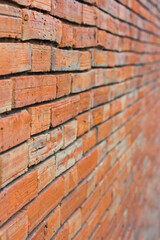 Perspective of a red brick wall