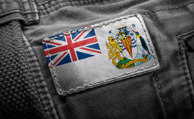 Tag on dark clothing in the form of the flag of the British Antarctic Territory