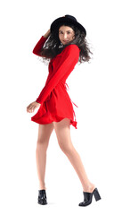 Portrait of fashionable young woman on white background