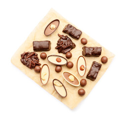 Different chocolate candies on white background
