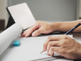 close up of a person working on a laptop