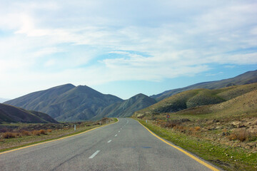 The road going through the clay mountains. Khizi region. Azerbaijan.
