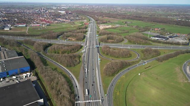 Knooppunt Hoevelaken in the shape of a clover aerial drone view. Intersection of the A28 and A1 highway The Netherlands.