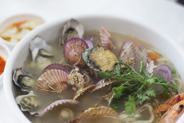 Korean noodle Soup with Various fresh seafood.