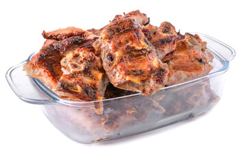 meat fried on coals in a glass cup isolated on a white background.pork ribs.selective focus.