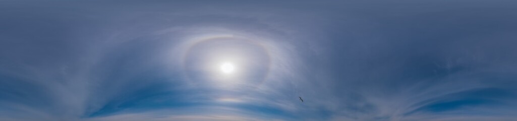 Blue sky panorama with Cirrus clouds in Seamless spherical equirectangular format. Full zenith for use in 3D graphics, game and editing aerial drone 360 degree panoramas for sky replacement.
