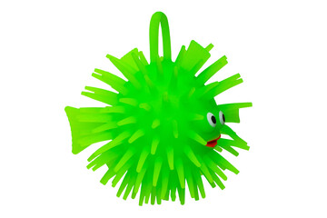 Rubber toys. Funny green puffer fish made of rubber. Cute toy fish isolated on a white background....