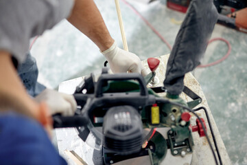 Young adult man working on a DIY budget renovation of his new home apartment.