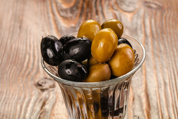 Tasty olive in the bowl