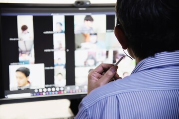 Obraz premium WFH, education instructor is working from home during COVID-19 lock down period, work from home teaching and examination online