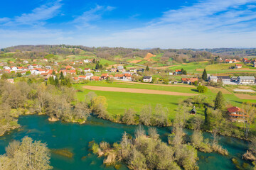 Fototapeta premium Beautiful countryside landscape, Mreznica river and Belavici village from air, Croatia