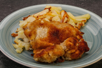 Pork schnitzel with roasted potato