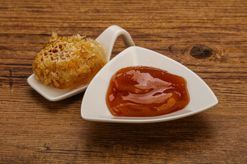 Natural honey in the bowl