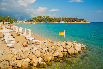 KEMER, TURKEY: Famous Qualista Beach in Kemer on a sunny day.