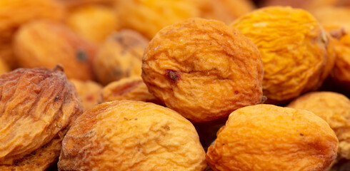 Dried apricots as an abstract background.