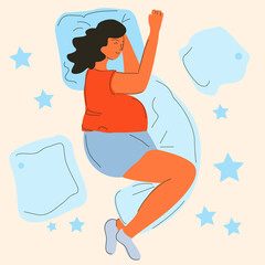 Pregnant woman sleeping on pillows