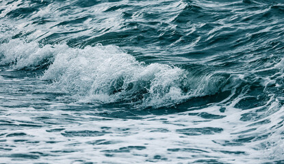 Fototapeta premium Wave in the sea with splashing water.
