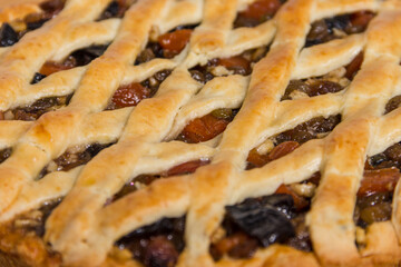 homemade pie with dried fruits, pastries at home, a treat, flour