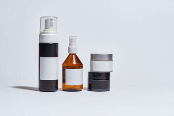 Different types of cosmetological bottles mockups