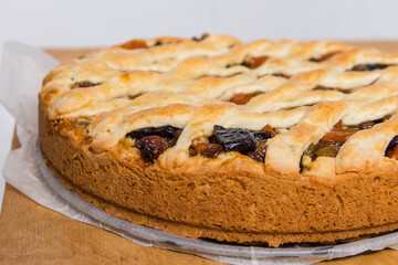homemade pie with dried fruits, pastries at home, a treat, flour