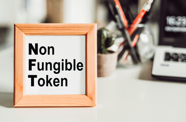 NFT non - fungible tokens inscription in the art frame.