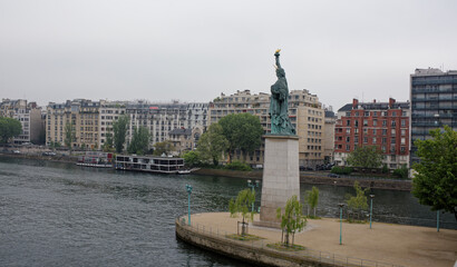  The swan island became a haven for a smaller Statue of Liberty. The copper lady, 11.5 meters high,...