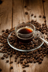 Fototapeta na wymiar cup of coffee with coffee beans