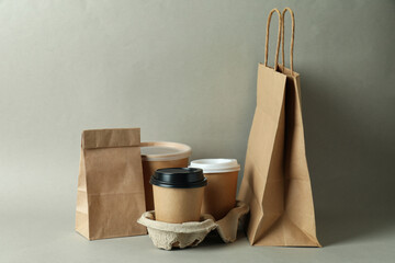 Delivery containers for takeaway food on gray background