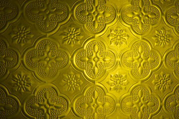 Pattern on window glass background. Yellow glass. 