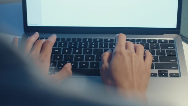 Freelance Asia lady using laptop hard work in living room at house. Working from home overload at night, remotely work, self isolation, social distancing, quarantine for corona virus prevention.