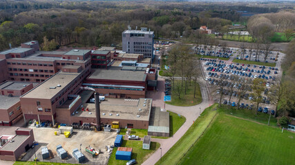 Turnhout, Belgium, 27 April 2021, Bird eye aerial view of the AZ Sint Jozef hospital in the City of Turnhout, Belgium, taken with a drone. High quality photo - obrazy, fototapety, plakaty