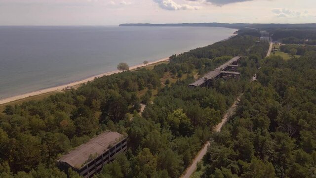 Flyover of KDF Prora Ruins on the island of R&uuml;gen in the Baltic Sea near Binz. They are hidden in the woods.