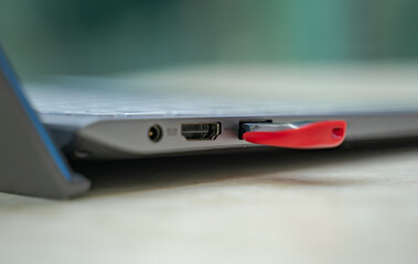 USB flash drive plugged in laptop.