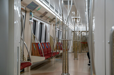 Doha, Qatar- October 29 2020 - Qatar metro compartment interior. seats with social distancing sign due to Covid 19.